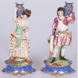 A set of (2) matching candlestick holders, porcelain figurines, France, 1st half 20th century.