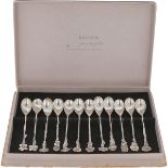 (12) piece set of silver flower teaspoons.