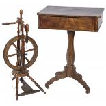 A nutwood work table and a nutwood spinning wheel, Holland, 19th century.