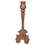 A bronzed carved wooden easter candlestick holder, Dutch, ca. 1900.