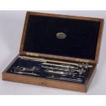 An extensive set of compasses in wooden case, Dutch, 1st half 20th century.
