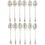 (12) piece set of silver apostle teaspoons.