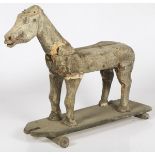 A wooden toy horse, 20th century.