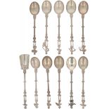 (11) piece set of teaspoons & sugar scoop silver.