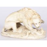 A marble sculpture of a lion fighting a snake, 1st half 20th century.