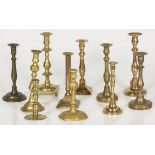 A lot comprising (10) copper candle holders, 19th century and later.