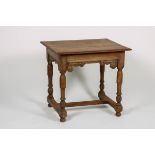 An oakwood Renaissance-style table, Dutch, late 19th century.