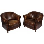 A set of 2 sheep leather club-armchairs, 2nd half 20th century.