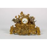 A ZAMAC chimney clock adorned with deer hunting scene, France, circa 1870.