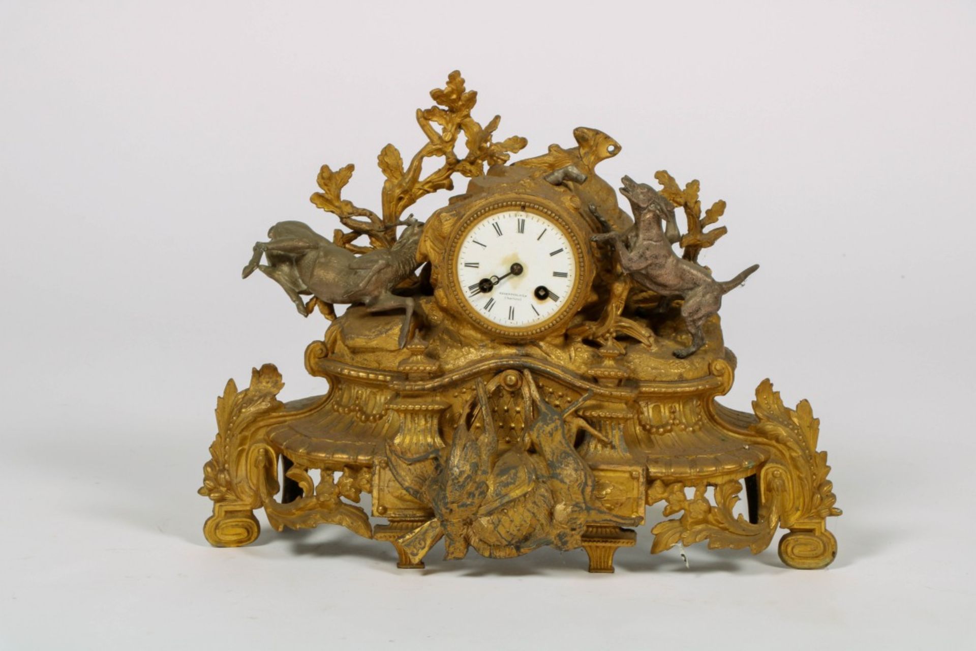 A ZAMAC chimney clock adorned with deer hunting scene, France, circa 1870.