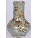 A celadon vase with gold-painted decor, Japan, early 20th century.