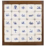A set of (25) tiles in blue-and-white motif, depicting various pieces of fruit, Dutch, 18th century.