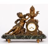 A ZAMAC chimey clock with a girl at a fountain, 20th century.