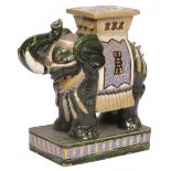 An Asian earthenware glazed garden stool in the shape of an Indian elephant, 20th century.