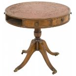 A round mahogany Regency-style table, England, 20th century.