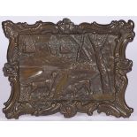A bronze relief plaque depicting game hounds in a landscape, Germany, 20th century.