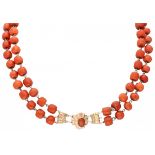 Two-row composed red coral necklace with a 14 ct. rose gold closure.