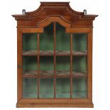 A mahogany veneered hanging display cabinet, Holland, 20th century.