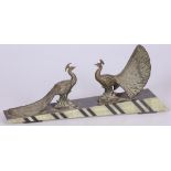 A bronze sculpture of two peacocks, France, 2nd quarter 20th century.