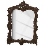 A nutwood rococo-style mirror, Dutch, ca. 1910.