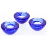 A lot with (3) cobalt glass "Ballo" votif candle-holders.