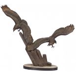 A ZAMAC sculpture of two bald eagles landing on a rock formation, Germany, 2nd quarter 20th century.