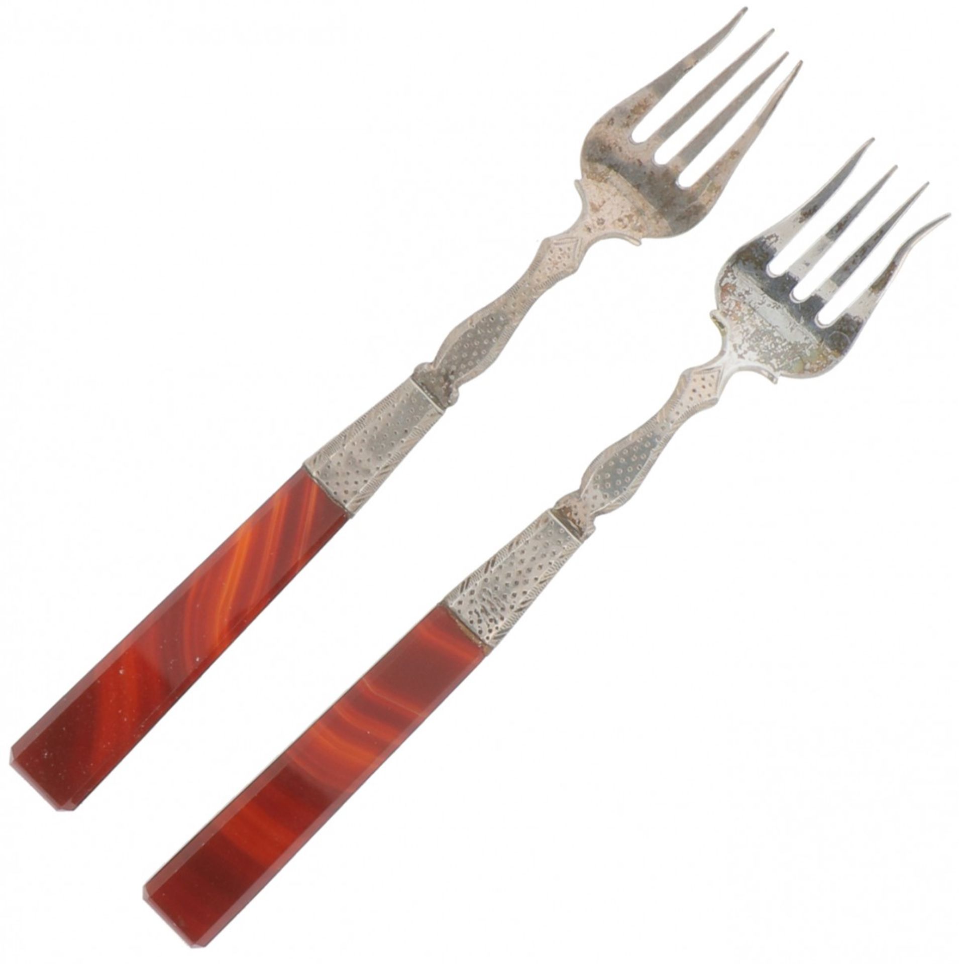 (2) piece set of silver meat forks.