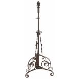 A wrought iron telescopic candlestick.
