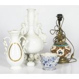 A lot comprised of various porcelain and earthenware items, including a large porcelain stem vase.