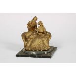A gilt sculpture of a loving couple, 20th century.
