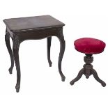 A blackened wooden side table together with a piano stool, Dutch, late 19th century.