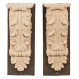 A set of (2) plaster wall corbels mount on wood, 20th century.
