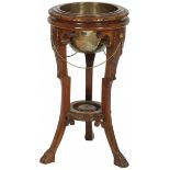A nutwood plant stand with copper container, France, early 20th century.