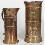 A lot of (2) copper measuring jugs, 20th century.