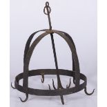 A wrought iron game rack.