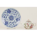 A miniature porcelain tea pot with Canton decor and a saucer with floral decoration, China, late 19