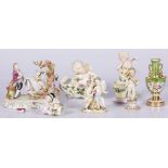 A lot of various porcelain items including a sculpture group of a man and woman in the forest, 20th