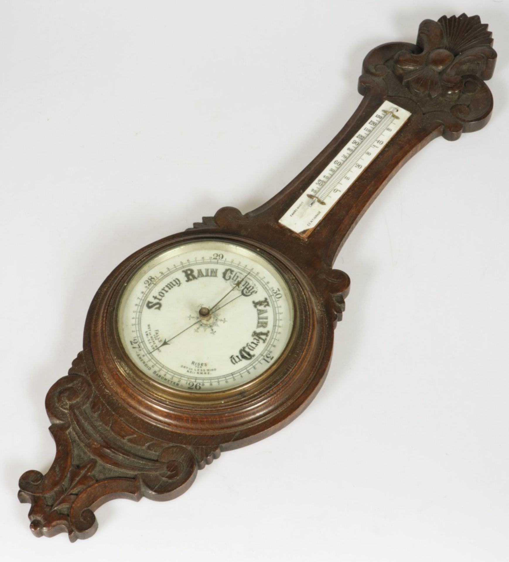 An oak banjo barometer, England, 20th century.