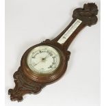 An oak banjo barometer, England, 20th century.
