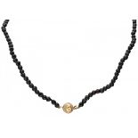 One row glass garnet necklace with a yellow gold closure - 14 ct.