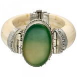 Bone bangle with green agate in a tribal silver setting.