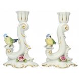 A set of (2) porcelain candlesticks decorated with birds and flowers, marked Christian Seltman. Volk