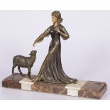 A ZAMAC sculpture of a lady with a sheep, Italy, 2nd quarter 20th century.