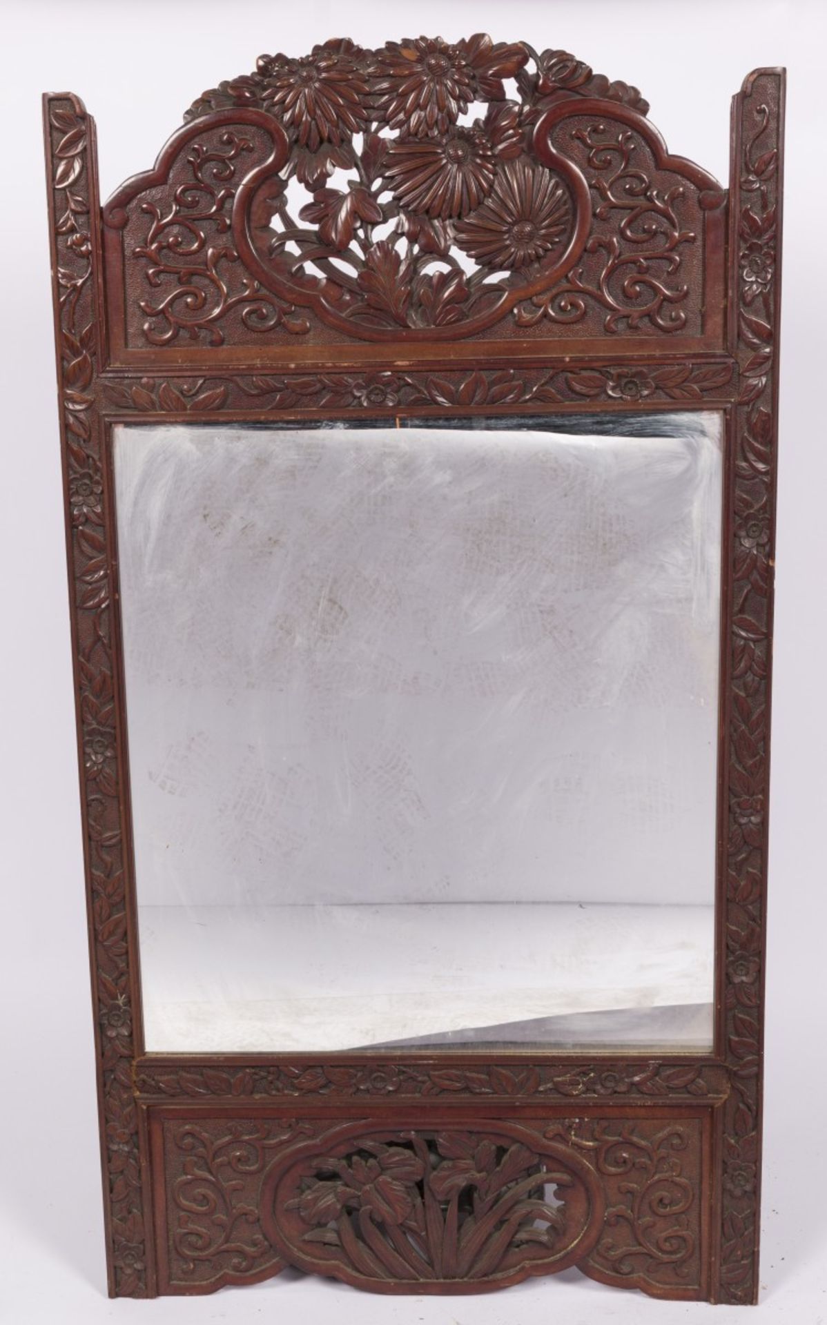 A mirror frame with Balinese carvings, Indonesia, 20th century.