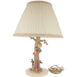 A "Hummel" lamp base. (1964-1973), with a climbing boy, Germany, 2nd quarter 20th century.