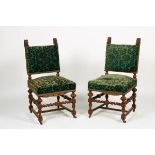 A set of (2) oakwood Renaissance-style chairs, Dutch, ca. 1910.