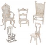 (5) piece miniature silver chairs.