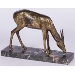 A bronze sculpture of a grazing gazelle, France, 2nd quarter 20th century.