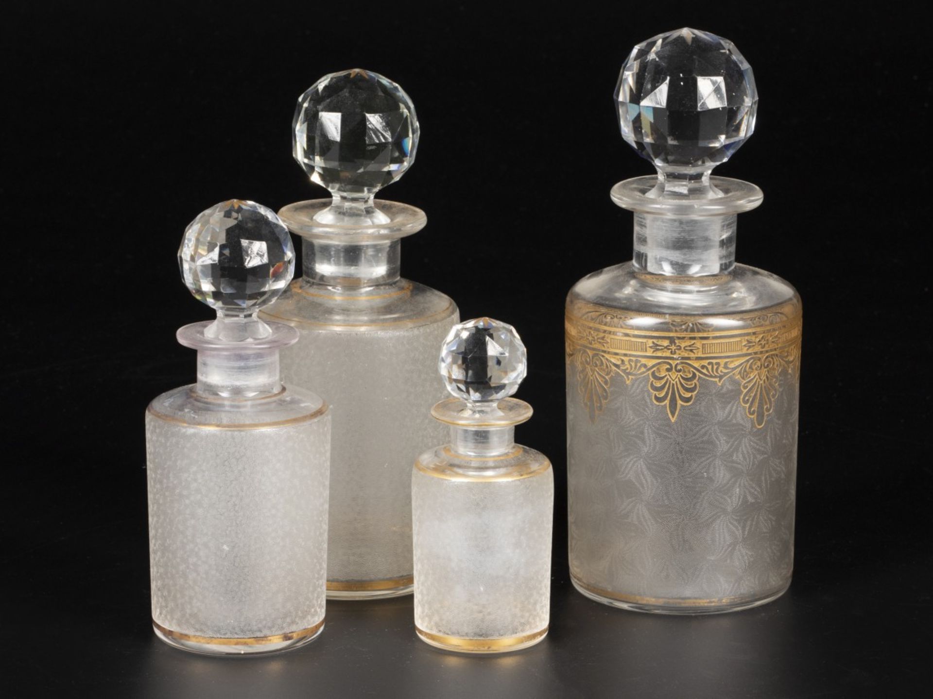 A lot comprised of (4) crystal carafes, France, early 20th century.