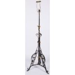 A wrought iron floor lamp, 20th century.